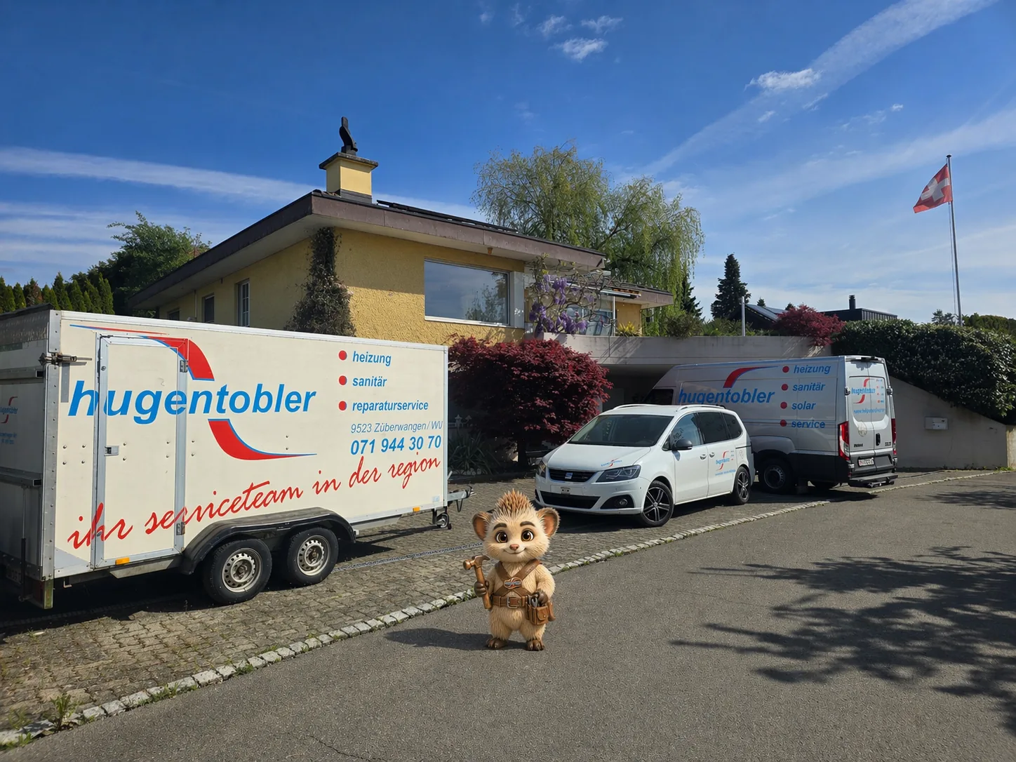 Firmensitz der René Hugentobler AG an der Mettlenstrasse 9 in Züberwangen mit Servicefahrzeugen und Anhänger